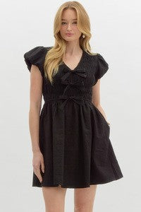 Chloe Bow Front Smocked Mini Dress in Black