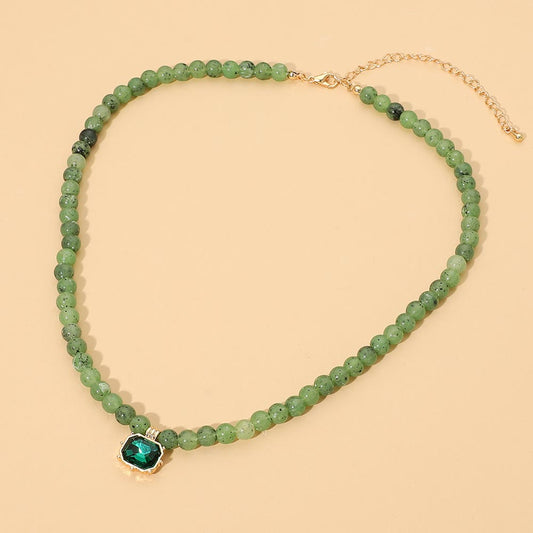 Faceted Rectangular Pendant Accent Round Beaded Necklace in Emerald & Gold