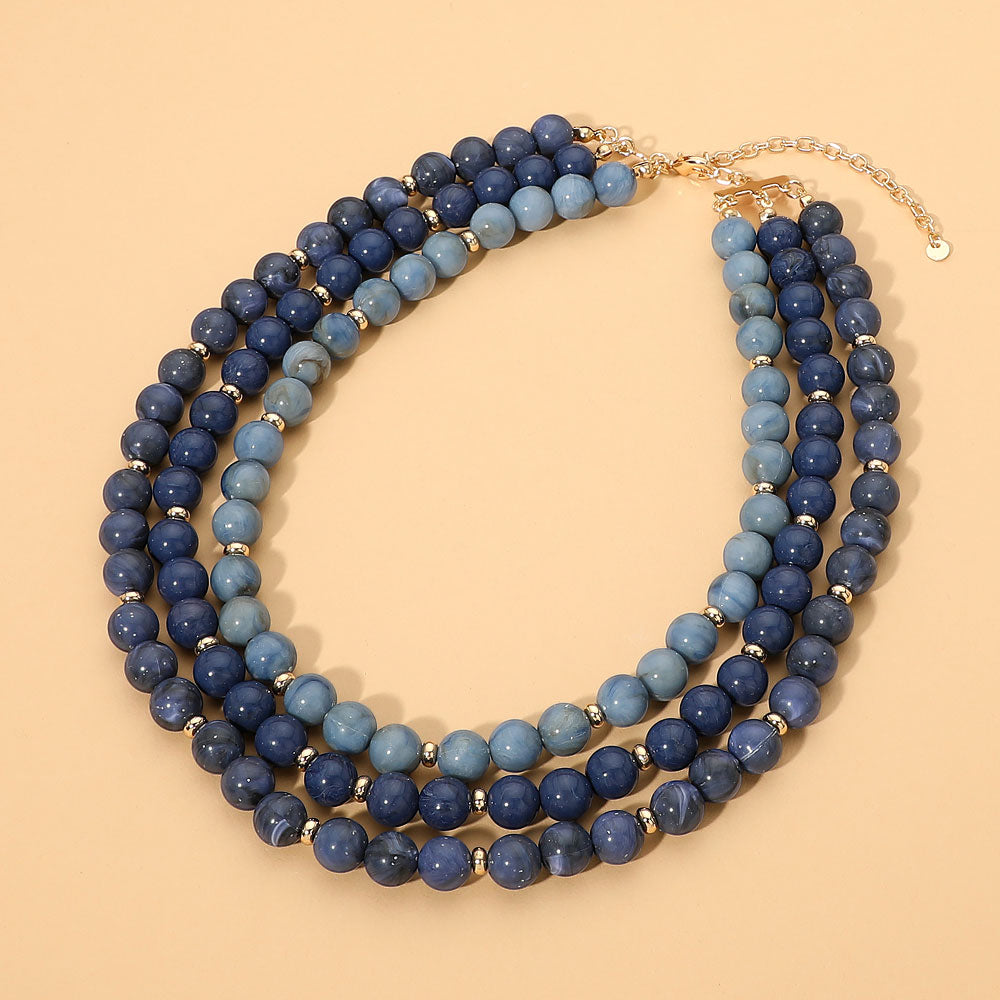 Triple Strand Beaded Statement Necklace in Gold, Multi & Navy