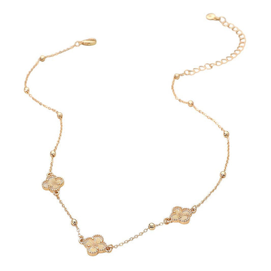 Floral Encased Quatrefoil Charm Station Necklace: Gold,White
